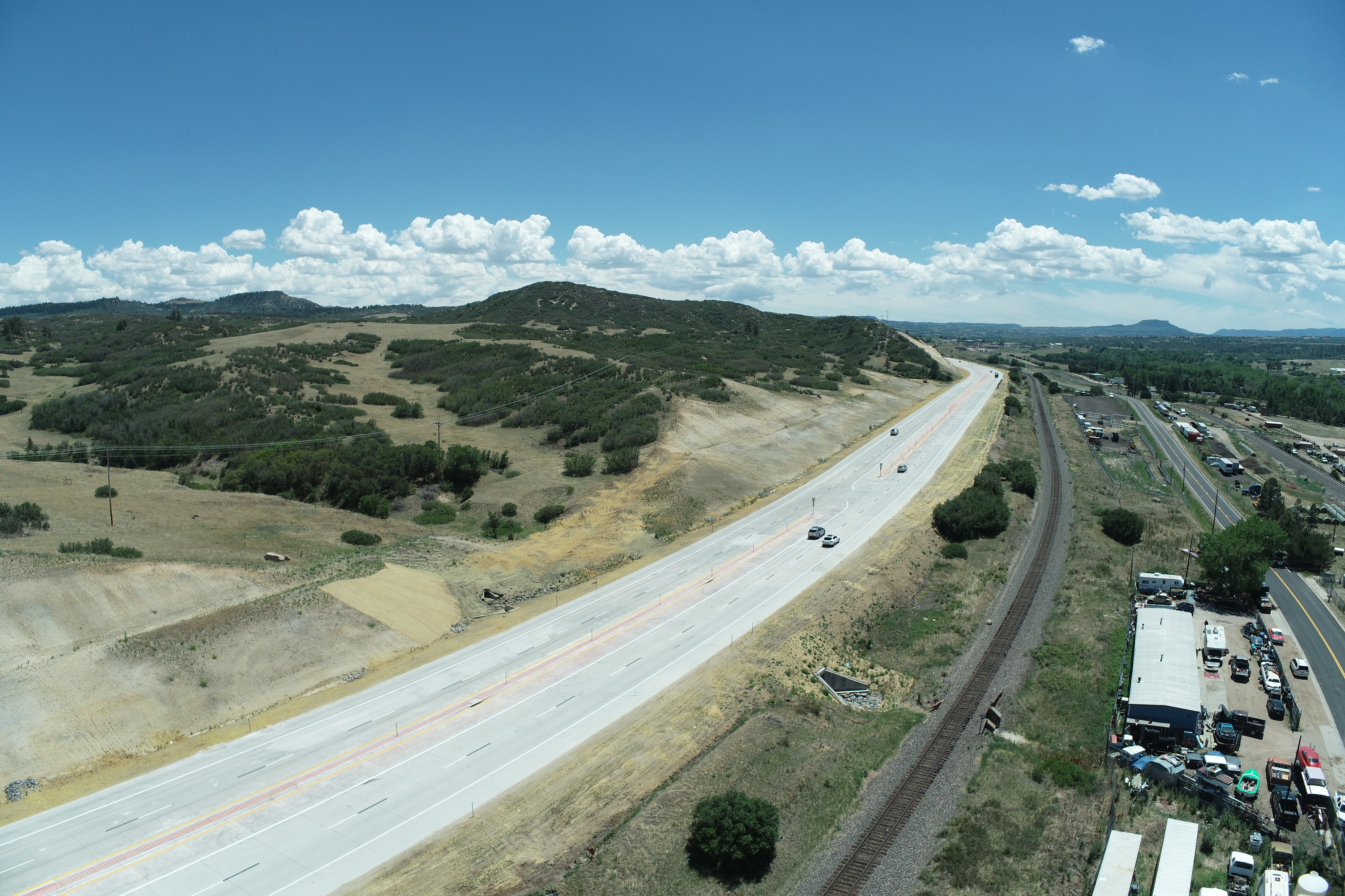 A view looking north over US 85 in Louviers, now four lanes. Photo courtesy of Castle Rock Construction of Colorado. June 2022. detail image