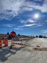 December 2021 – South view of the pavement progress from Kelly Ave. and US 85. thumbnail image