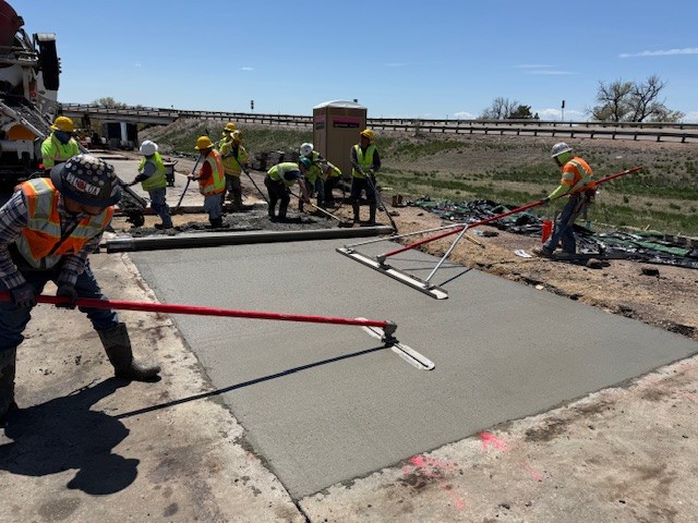 US 85 Concrete Panel Replacement Crews Finishing Up Concrete Surface May 2025.jpg detail image