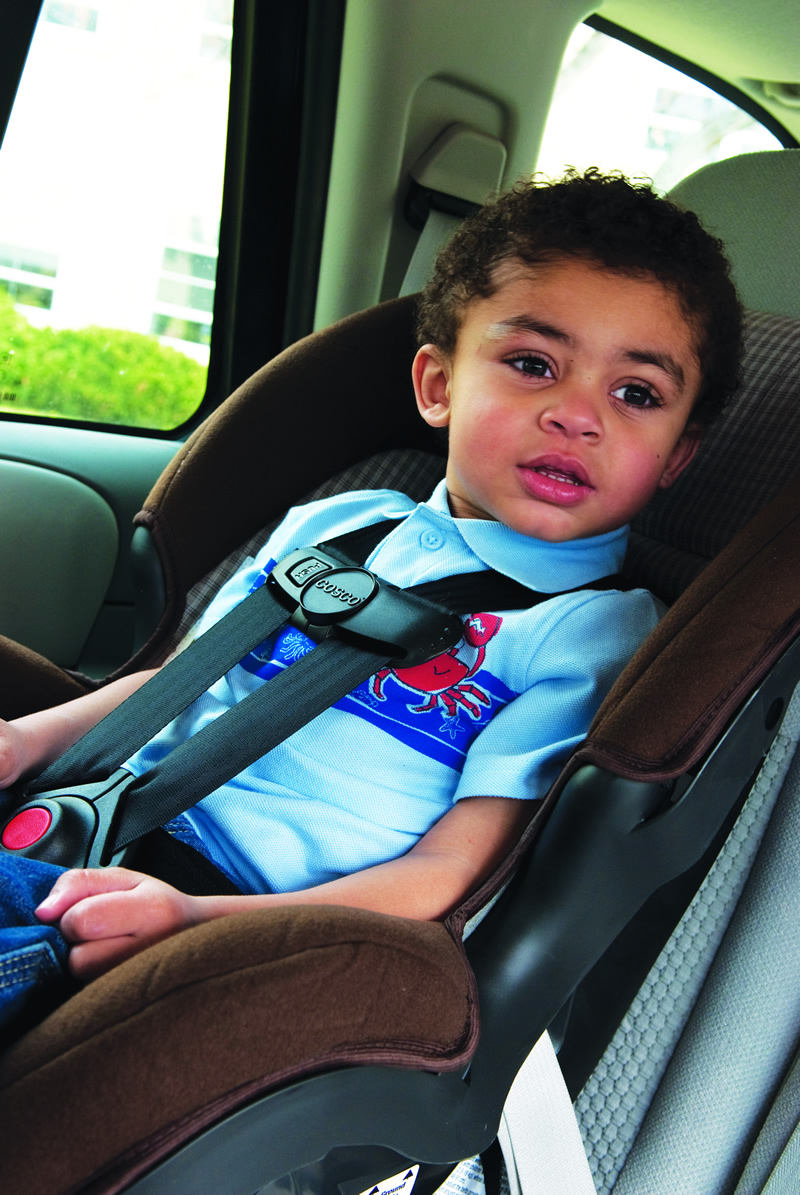 Child in a carseat detail image