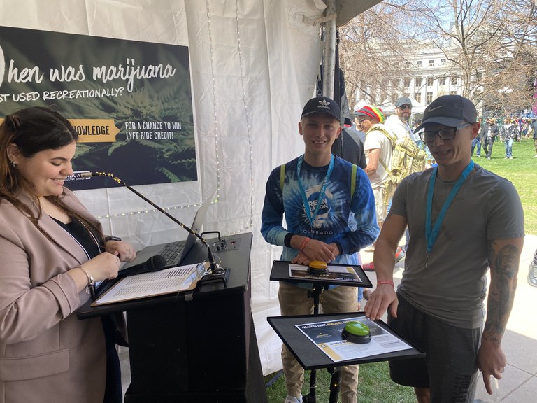 420 Festival attendees at CDOT booth to take cannabis safety quiz