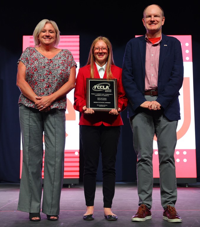 Carol Gould and GHSA CEO Jonathan Adkins honor the award winners of the FordFund-sponsored youth traffic safety FACTS program at the FCCLA National Leadership Conference in Denver.