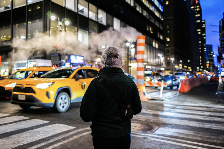 A pedestrian waits to cross Lexington Avenue in Manhattan in February 2024. 