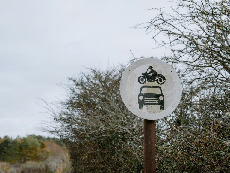 Ending vulnerable road user deaths by 2035 A sign warns drivers that there are motorcyclists present