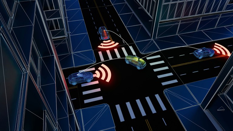 Digitalized image of vehicles on an urban street with city buildings. The vehicles have red bars in front to represent a digital connection between each of them.
