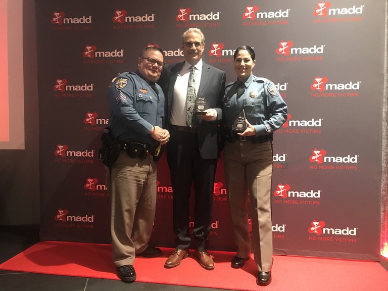 Safety champions pose on the red carpet at MADD's annual Tie One On for Safety breakfast.