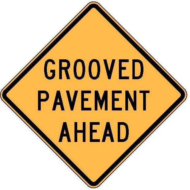 W20-52 Grooved Pavement Ahead.JPEG