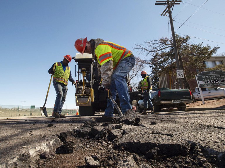 workers repairing the road